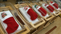 kimmiebubimi:  fckenstephy:  welele:  Navidad Hospitalaria  They actually do this, my mom told me that when i was born they brought me in a stocking, so cute…  I love this   Wow