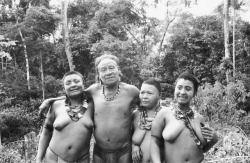  Kunibu and his family in the Akuntsu village. Photo: Adelino de Lucena Mendes, 2002. Via Povos Indigenas no BrasilToday the Akuntsu comprise one of the smallest ethnic groups in Brazil. Marked by the usurpation of lands and massacres, their history