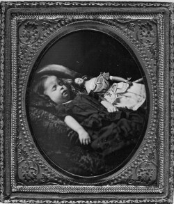 mortisia:  Post morten daguerreotype portrait of a child with her dollca. 1850’s, via Cowan’s Auctions | My edit 