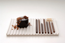 milkeu:  chocolate pencils: “chocolate pencils” come in a number of cocoa blends that vary in intensity, and chocophiles can use the special “pencil sharpener” that comes with their plate to grate chocolate onto their dessert. 