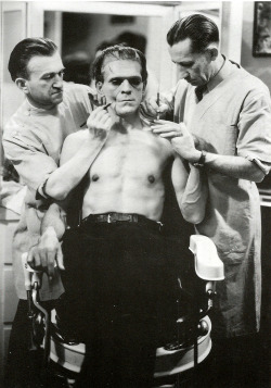 Boris Karloff undergoing make-up application during the filming of Frankenstein (1931). From The Essential Frankenstein: The Monster, the Myths and the Movies, by Robert Jameson (Magna Books, 1992). From an Oxfam shop in Sherwood, Nottingham.