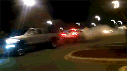 cummins-trucks:  Cummins pulling a Chevy through a parking lot ahaha
