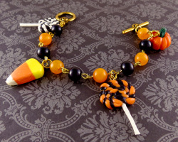lolitapopshop:  Celebrate the spooky season with this adorable Halloween bracelet! &lt;3Available here: https://www.etsy.com/listing/252990267/halloween-charm-bracelet-polymer-clay 