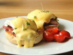 theshyxibitionista:  cravingsatmidnight: Eggs Benedict is an American breakfast &amp; brunch dish, consisting of 2 halves of an English muffin, topped with Canadian-style bacon, or sometimes ham or bacon, a poached egg; and hollandaise sauce. The dish