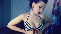 PuddleWonderful has the sailor pin-up pose down in this classic shot.