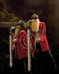 goodoleboyslikeme:  chillypepperhothothot:  	ZZ-Top by Andre    	Via Flickr: 	ZZ-Top live in concert   Dusty Hill &amp; Billy Gibbons