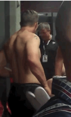 notashamedtobemen:  NFL quarterback Luke McCown strips naked in the Atlanta Falcons postgame locker room. Also, you can see the video here. 