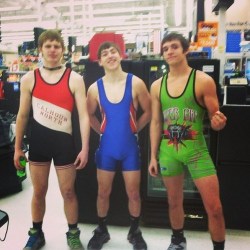 Wrestling champs out shopping they way they were always meant to be&ndash;in singlets. 