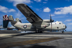 americasnavy:  A C-2A Greyhound makes an arrested landing on the flight deck of the Navy’s forward-deployed aircraft carrier USS George Washington. The primary mission of a C-2A is the transport of high-priority cargo, mail and passengers between carriers