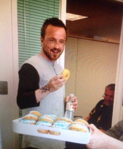 allaaronpaul:  Taking a break from being tortured by Todd, Aaron enjoys a blue meth donut behind the scenes. 