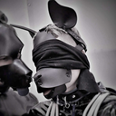 emobcsmslave:  rubbernus:  Here is my rubberized boy restrained in Segufix for the first time. First he was freed from his chastity. Then he was told to get into rubber: Suit, toe socks, S10 gasmask and mitts to restrict his hands. After that we made