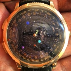 asapscience:  The Midnight Planétarium watch not only tells time, but follows the orbit of our solar system’s planets.  