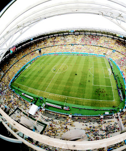 footballinmyvains:  The World cup / This image was taken using a fish eye lens.) A general view of the stadium before the 2014 FIFA World Cup Brazil Group A match between Brazil and Mexico at Castelao on June 17, 2014 in Fortaleza, Brazil. 
