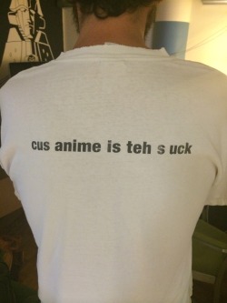 toonami:  This is a shirt being worn by one of our editors at Adult Swim, Phil. It was created about a decade ago for Adult Swim employees only. It has been misconstrued as being “anti anime,” by some people. Here’s the story: back in the early