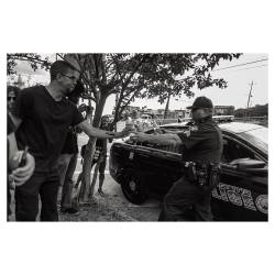 film-god:  Officer hands protesters bottled water on a hot summer afternoon ✌🏿️ Lead by example. #atlanta #police #protest #fuji #fujifilm  (at Atlanta, Georgia)