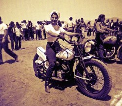 Vintage 50&rsquo;s-era candid photo captures Patti Waggin preparing for another motorcycle club riding competition.. More pics of Patti can be found here..