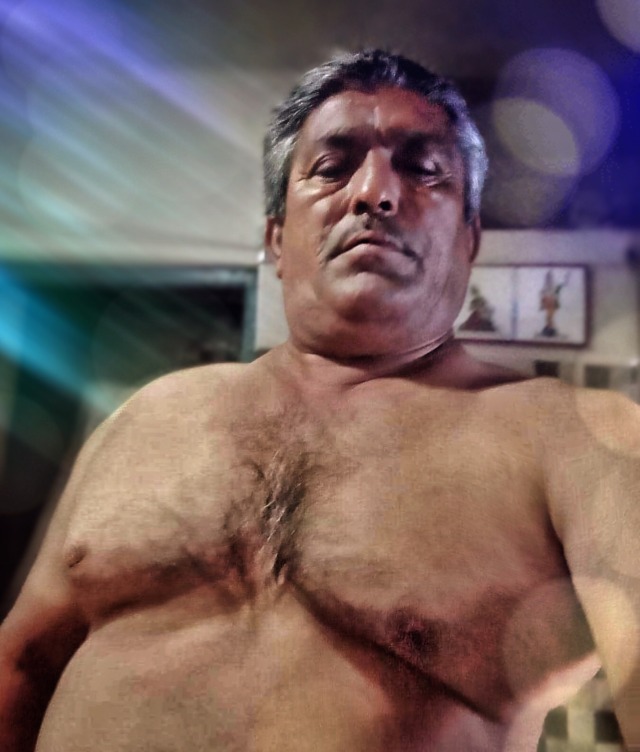 indianbears:Horny Indian daddy bear Karunan is home alone waiting for you. More hot pics of him in my Twitter Indianbears Official. Tumblr is hopeless. 