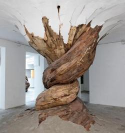odditiesoflife:  Trees Burst Through Gallery Walls and CeilingsBrazilian artist Henrique Oliveira’s powerful recycled wood art installations snake through their exhibition spaces like massive living trees that burst out of walls and through ceilings.