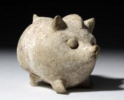 archaicwonder:  Greek Terracotta Pig Rattle, 6th-3rd Century BC Possibly from Cyprus A child’s toy in the shape of a pig, probably mold made and with a pebble sealed within. He has delightful applied eyes, nose, pointed ears, and curly tail and stands