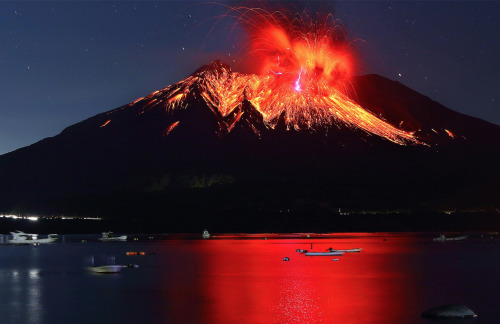 nubbsgalore:  photos of sakurajima, the most active volcano in japan, by (click pic) takehito miyatake (previously featured) and martin rietze. volcanic storms can rival the intensity of massive supercell thunderstorms, but the source of the charge