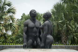 The bronze sculpture &ldquo;Redemption Song&rdquo;, depicting a man and woman emerging from a pool of water, meant to wash away the pain of slavery is seen in Kingston (Jamaica) on June 29, 2012. more here