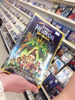 gallifrey-feels:  zzazu:  britney2007spears:  joebarborak:  thepurdypurdy:  THIS PHOTO WAS TAKEN LAST WEEK AT MY LOCAL KMART. YES, THAT IS A SEALED VHS TAPE OF JIMMY NEUTRON THE MOVIE, IN 2014, AT KMART, SITTING NEXT TO DVDS AND BLU-RAYS, PRICED AT Ű.99 