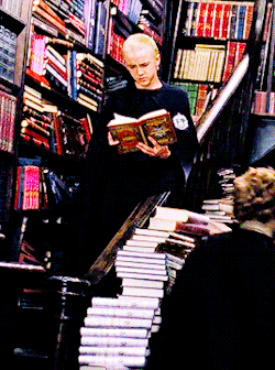 indie-band:  NO BUT DO YOU WANT TO HEAR MY THEORY FOR THIS SCENE This doesn’t comply with the books, I realize, but it doesn’t exactly not comply either. Why would Malfoy rip a page out of a random book? If he wanted the book, he could have just bought