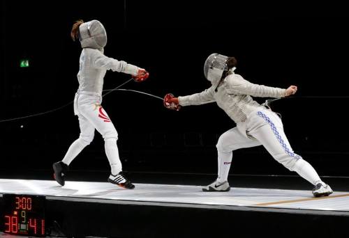 modernfencing:  [ID: two sabre fencers in adult photos