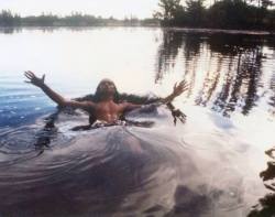 welcometothelovecastle:  Jaco takes a dip. Mowgli, Nature Boy. Copyright Ingrid Pastorius 