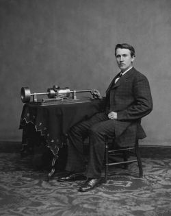 Photograph of Edison with his phonograph (2nd model), taken in Mathew Brady&rsquo;s Washington, DC studio in April 1878.