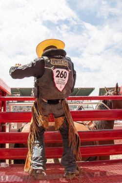 cowboysstuds:  Cheyenne Frontier Days™ &ldquo;It’s boots and chaps, it’s cowboy hats&rdquo; A fine, cooler day for a little slack, and the seventh rodeo performance PRCA Rodeo at Cheyenne Frontier Days Rodeo July 25th, 2014 