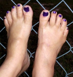 my husband says in this pic that it would suck to be on the other side of the fence where he couldnt get to my sexy southern soles     unless ur a sissy sitting in the corner jerkin ur dick n being shy to come over n suck my toes n smell my feet   