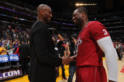 nba:  Dwyane Wade #3 of the Miami Heat and Kobe Bryant #24 of the Los Angeles Lakers converse after a game at STAPLES Center on December 25, 2013 in Los Angeles, California. (Photo by Andrew D. Bernstein/NBAE via Getty Images) 