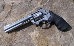 gunsknivesgear:  Smith &amp; Wesson .357 Magnum. “A Smith and Wesson always beats 4 aces.” - Western proverb