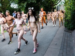 Nude runners, 300 for a cause.Â   streakers:  300 brave London souls ran around London Zoo in aid of Sumatran Tigers which now number less than three hundred. 
