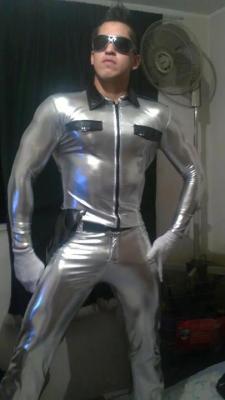 trancedboys:  Once he had dressed up in the silver suit “just for laughs”, Cameron donned the hypnotic glasses and instantly felt his mind warped and then reprogrammed to make him an obedient robot, whose sole function was to serve his master. 