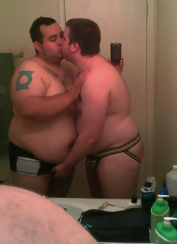 bellylover520:  man, i wish i were the guy on the left. i envy the body, and the action. haha 
