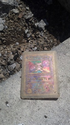 deadmansdesire:  damnguido:  sean3116:  Lost in the cracks of my house’s front porch over a decade ago and unearthed today by a construction project, this “Ancient Mew” card now fully looks the part. Now 22 years old, I am very pleased to have it