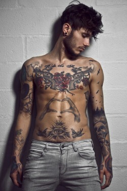 Dawid Auguscik. Love the tattoos.