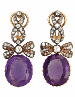 diamondsinthelibrary:  How do you like these babies? Antique Silver, Gold, Diamond and Amethyst Pendant-Earrings:  2 oval amethysts ap. 24.50 cts., old-mine cut diamonds, posts &amp; clip-backs added later. (Via Doyle New York.) 