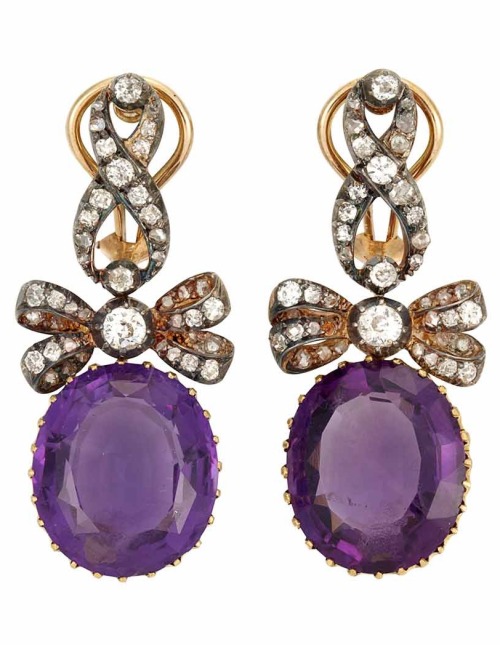 diamondsinthelibrary:  How do you like these babies? Antique Silver, Gold, Diamond and Amethyst Pendant-Earrings:  2 oval amethysts ap. 24.50 cts., old-mine cut diamonds, posts & clip-backs added later. (Via Doyle New York.) 