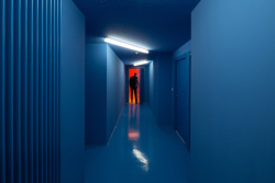 repulsed:  a corridor painted in electric blue by paul le quernec