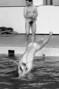 notdbd:Swim coach and college swimmer in the good old days when men swam nude. 