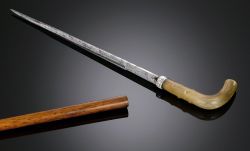 art-of-swords:  Knobby Horn Toledo Sword Cane Dated: 19th century Measurements: overall length 34 3/4”  Set atop an elegant Malacca shaft, the delightful knobby handle is actually the hilt of a sharp Toledo steel sword. Toledo swords are considered