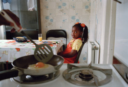indoafrican: Chris Steele-PerkinsMother cooks breakfast for her daughter.