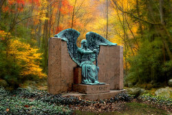 sixpenceee:  Lake View Cemetery: The Haserot Angel  It’s called the Angel of Death Victorious. Due to an effect of weathering and erosion on the bronze, the statue appears to be weeping black tears at all times.  
