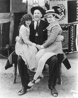  Jobyna Ralston and Harold Lloyd sit in John Aasen’s lap - 1923 John Aasen was 8’ 4” and played the giant in Harold Lloyd’s “Why Worry” (1923) 