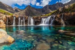 madeofpatterns:  odditiesoflife:  The Fairy Pools on the Isle of Skye The stunning rock formations caused by erosion from the crystal clear water running down from the Cullins, the largest mountains on the Isle of Skye in Scotland, created the legendary