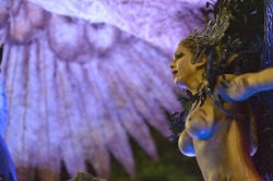 Topless woman at a Brazilian carnival.