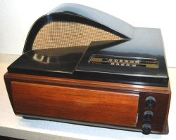 Philco 49-1401 Radio/Phonograph 1949 Plays 10&quot; and 12&quot; 78 rpm records. It contains Philcos M-7 automatic record player. Just flip down the front and slide your favorite record in. It starts automatically. source: http://antiqueradios.com 